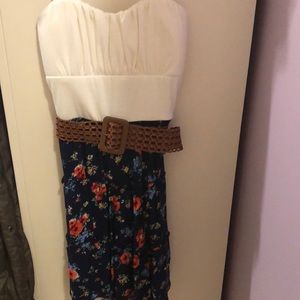 White and blue flowered dress with a brown belt